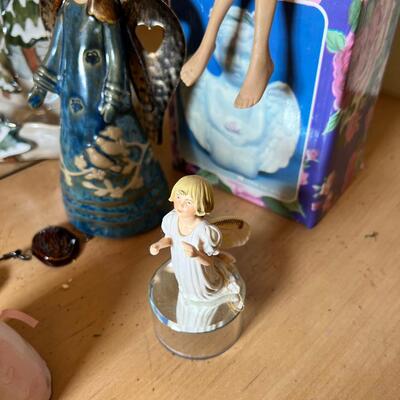 Angels and fairies, 2 ceramic  Bells, 2 larger candle holders 1 new in box