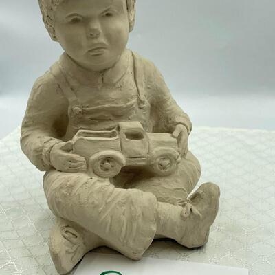 Boy with Truck Sculpture