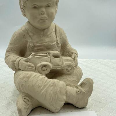 Boy with Truck Sculpture