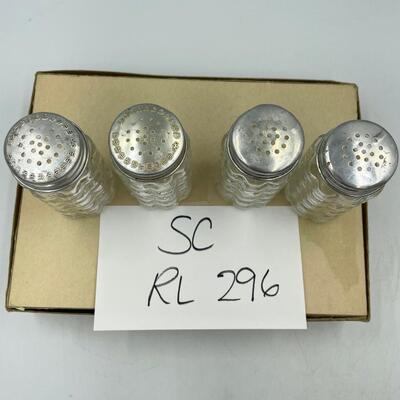 4 individual cut glass shakers