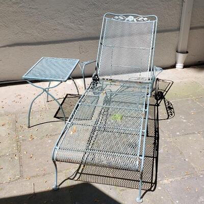 wrought iron lounge chair and side table
