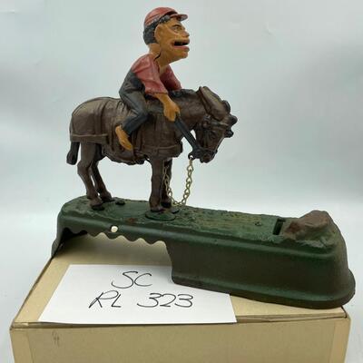 Mechanical bank â€œI always did spise a muleâ€ book of knowledge bank