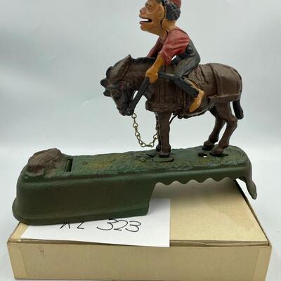 Mechanical bank â€œI always did spise a muleâ€ book of knowledge bank
