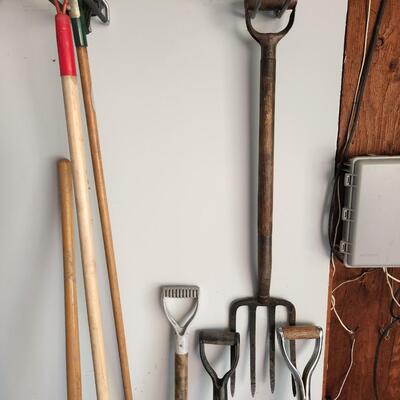 Lot of Shovels, Fork ,Racks, Brooms pruning saw.