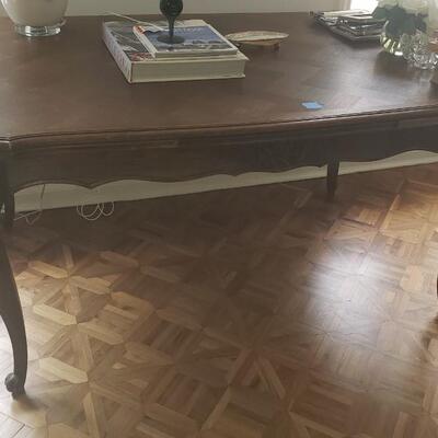 Vintage dining room table with extendable leaves