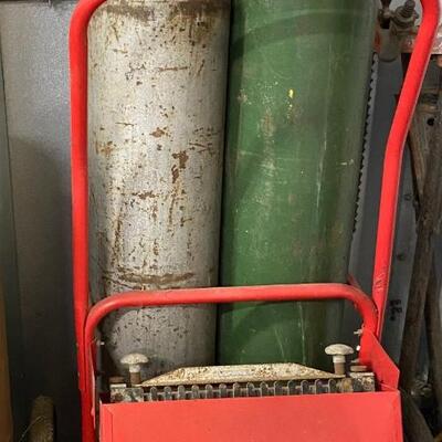 Two oxygen tanks for welding with rolling cart