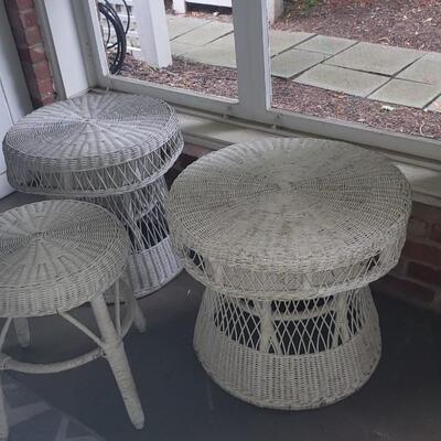Three wicker side tables