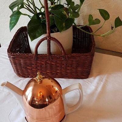 Solid copper tea pot cozy with ceramic teapot