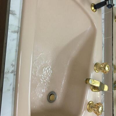 Vintage cast iron dusty pink bathroom sink with hose