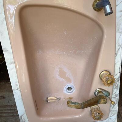 Vintage cast iron dusty pink bathroom sink with hose