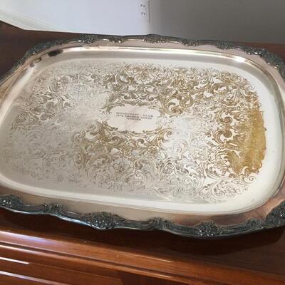 Silver plate tray with handles.