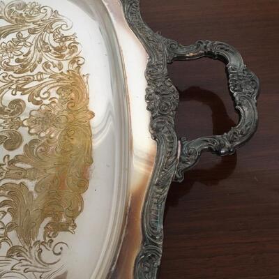 Silver plate tray with handles.