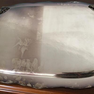 Silver plate tray with handles.