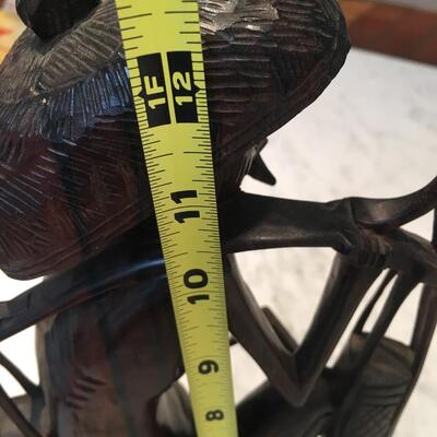 Carved wood statue of man