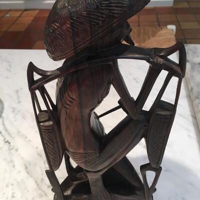 Carved wood statue of man