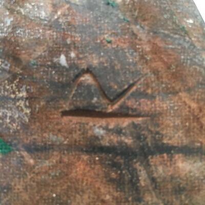 Carved wood statue of man