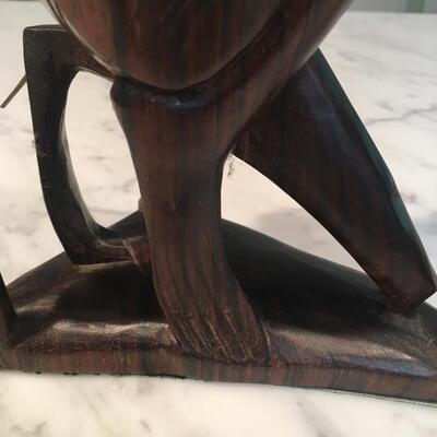 Carved wood statue of man