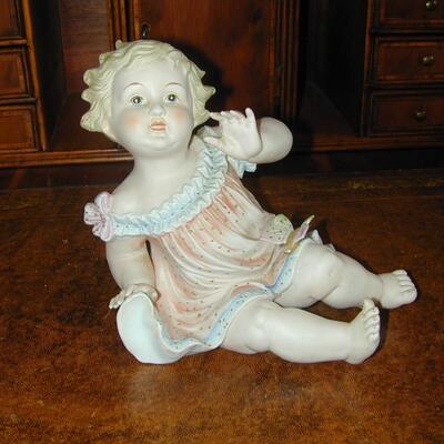 Antique Bisque Piano Baby With Butterfly - 6.75