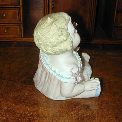 Antique Bisque Piano Baby With Butterfly - 6.75