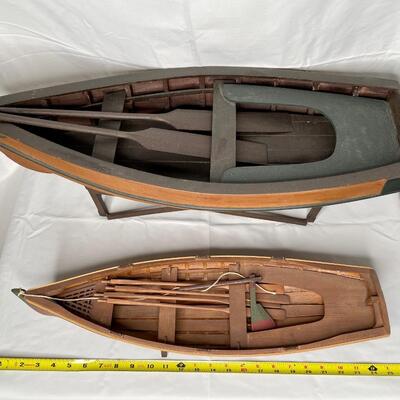 2 wooden boat models