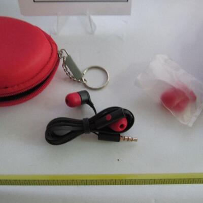 Earbuds in Case and Flashlight