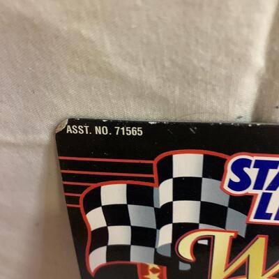 3 NASCAR items - 2 cars and 1 Starting Lineup Figure 4.5â€ tall approx