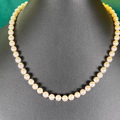18" Cultured pearl with 925 silver clasp .