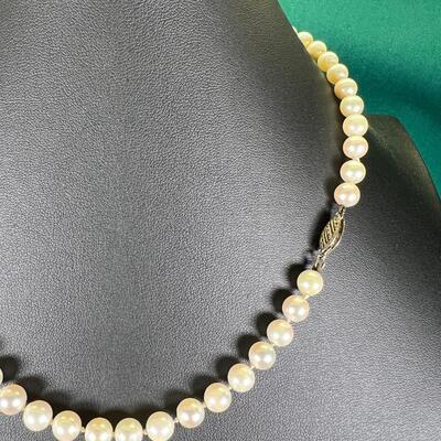 18" Cultured pearl with 925 silver clasp .