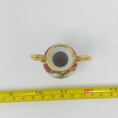REMARKABLE LIMOGES PORCELAIN TWO HANDLED MINIATURE VASE