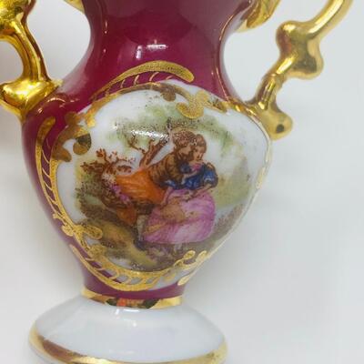 REMARKABLE LIMOGES PORCELAIN TWO HANDLED MINIATURE VASE