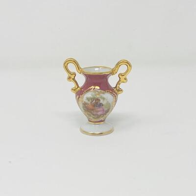 REMARKABLE LIMOGES PORCELAIN TWO HANDLED MINIATURE VASE