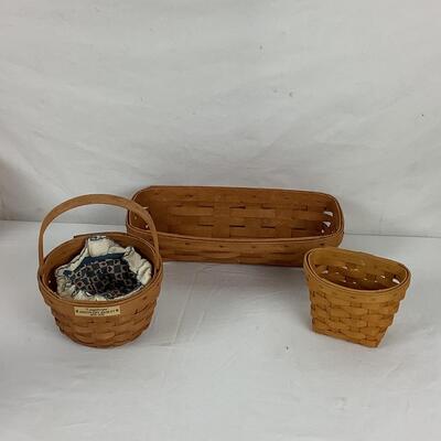 Lot 5376. Longaberger Miniature Baskets and Tree
