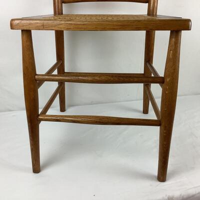Lot. 5403. Two Vintage Oak Spindle Back Cane Chairs