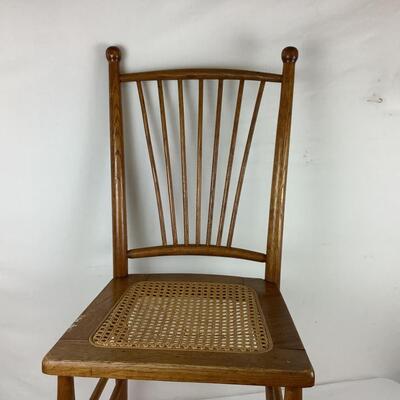 Lot. 5403. Two Vintage Oak Spindle Back Cane Chairs