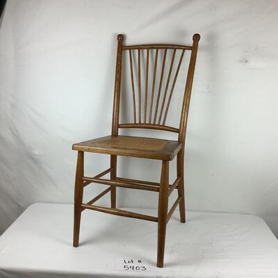 Lot. 5403. Two Vintage Oak Spindle Back Cane Chairs