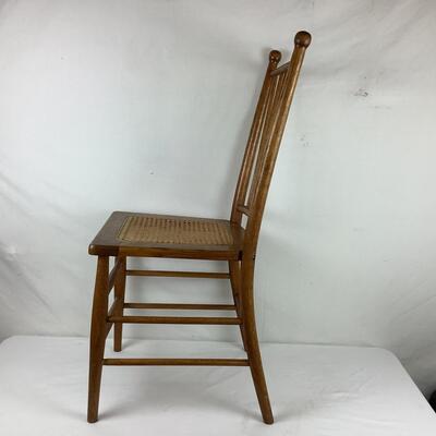 Lot. 5403. Two Vintage Oak Spindle Back Cane Chairs