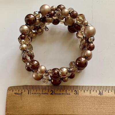 LOT 115R: Collection of 4 Fashion Bracelets: Faux Pearls, Beaded, Cuff and Stretch