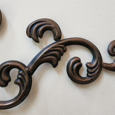 LOT 128RP: Ornate Painted Metal Scroll Wall Plaque