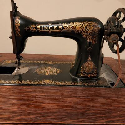 LOT 137RP: Antique Oak Cabinet Singer Sewing Treadle Machine