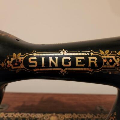 LOT 137RP: Antique Oak Cabinet Singer Sewing Treadle Machine