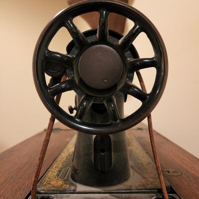 LOT 137RP: Antique Oak Cabinet Singer Sewing Treadle Machine