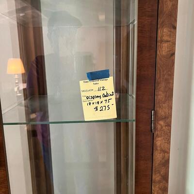 Patterned wood with glass shelves display case