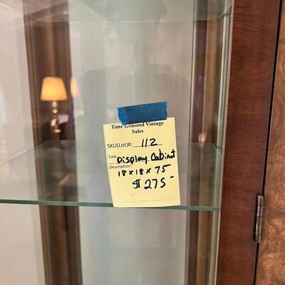 Patterned wood with glass shelves display case