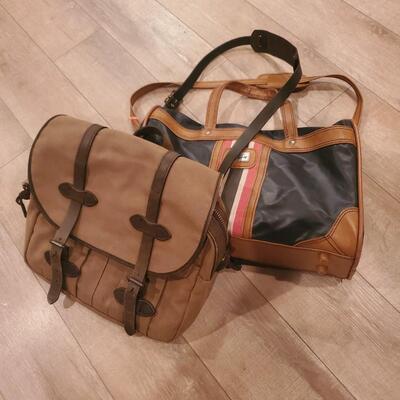 LOT 153G: Genuine Filson Messenger Bad and Skyway Travel Carry on Duffel