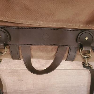 LOT 153G: Genuine Filson Messenger Bad and Skyway Travel Carry on Duffel