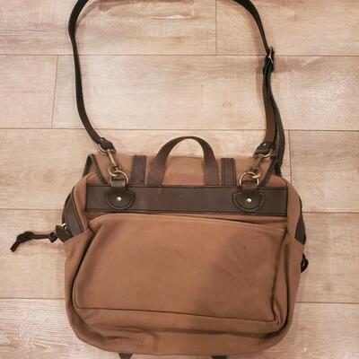 LOT 153G: Genuine Filson Messenger Bad and Skyway Travel Carry on Duffel