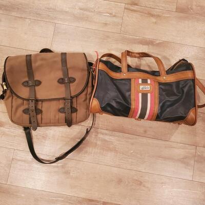 LOT 153G: Genuine Filson Messenger Bad and Skyway Travel Carry on Duffel