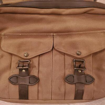 LOT 153G: Genuine Filson Messenger Bad and Skyway Travel Carry on Duffel