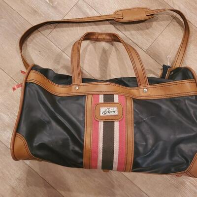 LOT 153G: Genuine Filson Messenger Bad and Skyway Travel Carry on Duffel