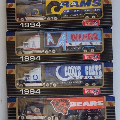 lot 180G: 6 Collectable 1994 NFL Licensed Toy Trucks